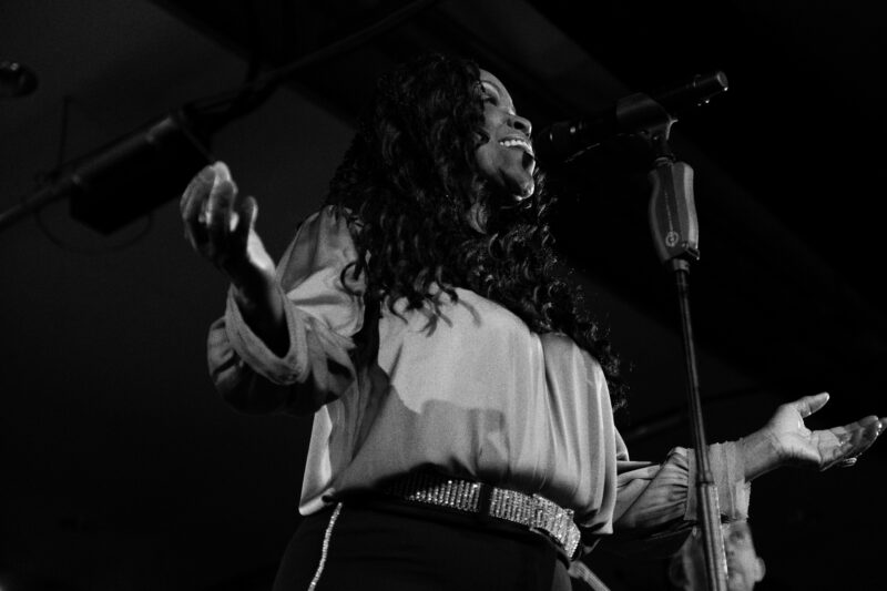Black and white image of performer on stage